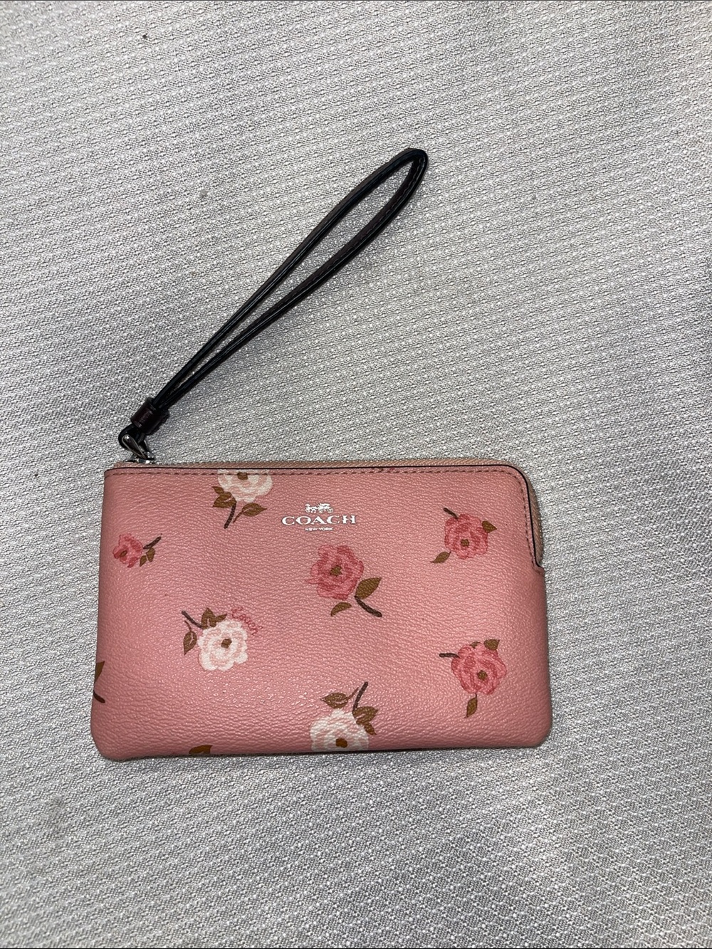COACH Pink Floral Wristlet with Black Strap